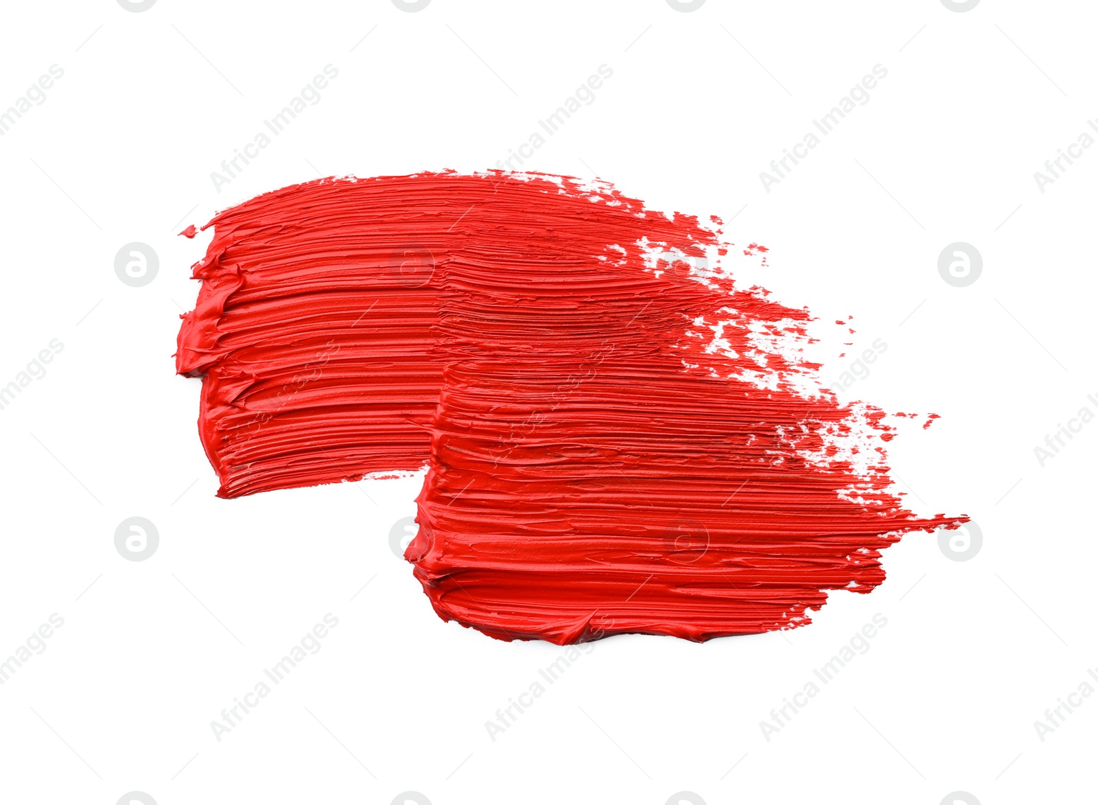 Photo of Red oil paint stroke on white background, top view