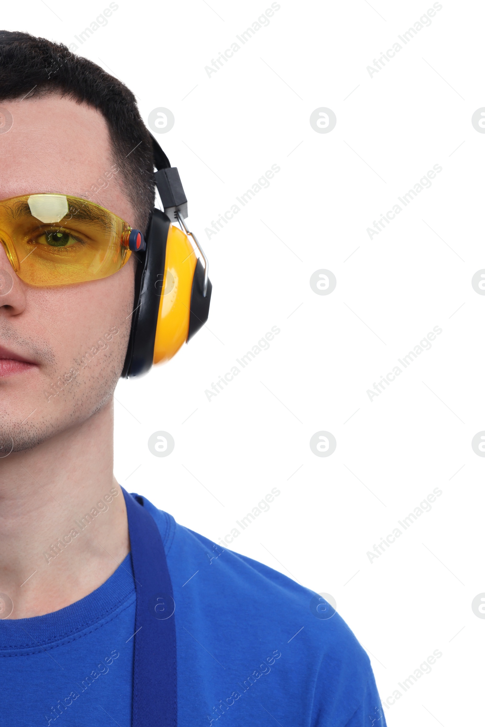 Photo of Young man wearing safety equipment on white background