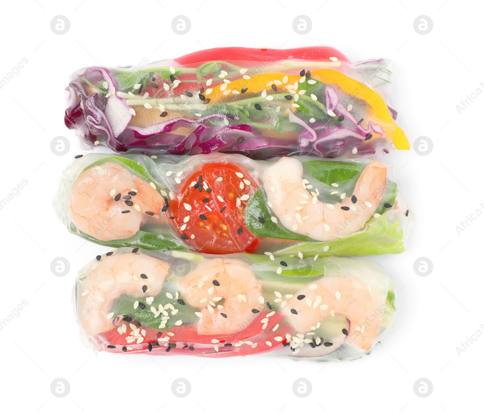 Photo of Many different rolls wrapped in rice paper on white background, top view