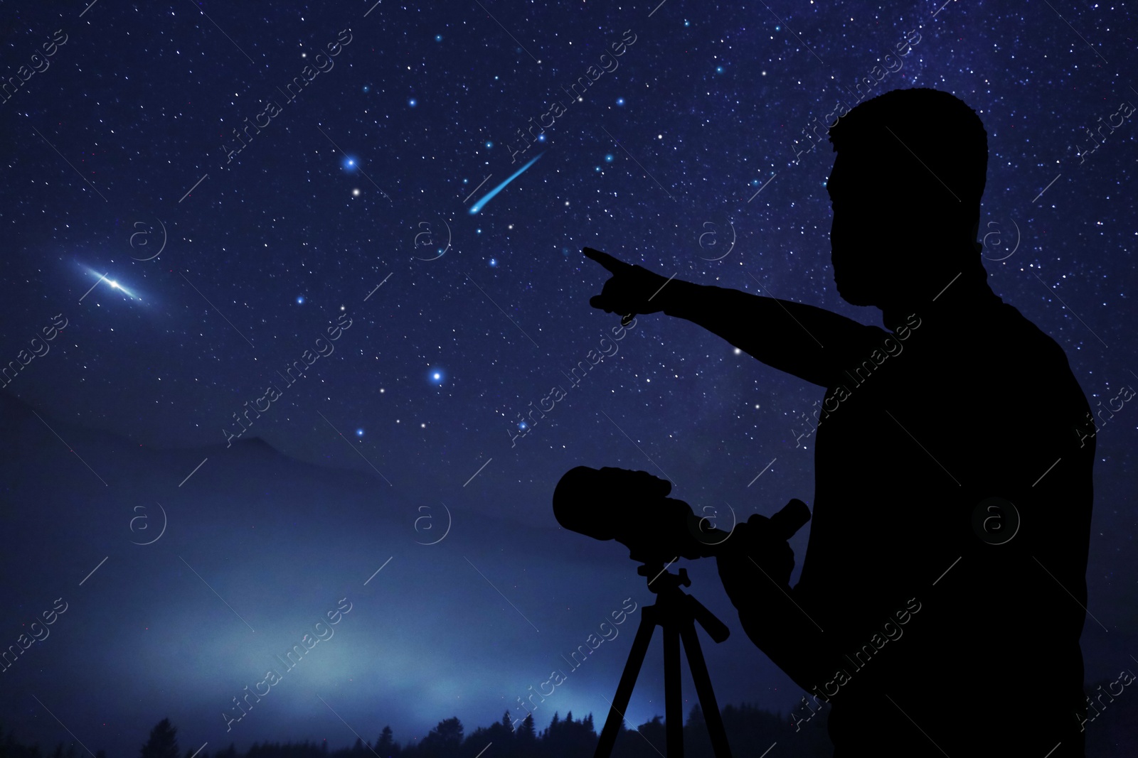 Image of Astronomer with telescope pointing at shooting star outdoors