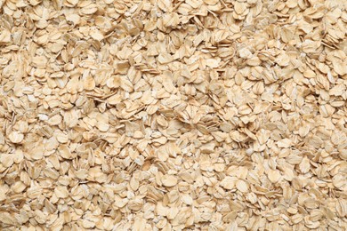 Top view of rolled oats as background