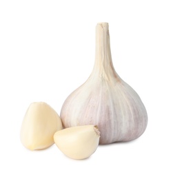 Photo of Fresh organic garlic bulb and cloves on white background