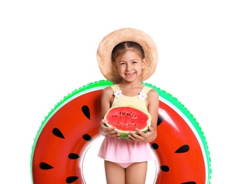 Photo of Cute little girl with inflatable ring and watermelon on white background