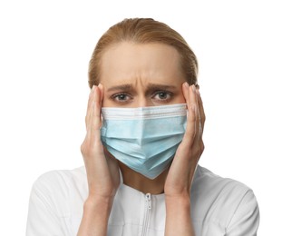 Doctor with protective mask feeling fear on white background