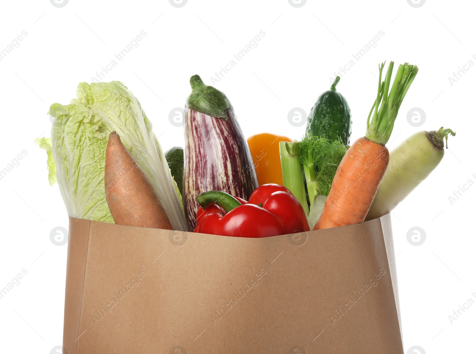 Photo of Paper bag with vegetables on white background, closeup