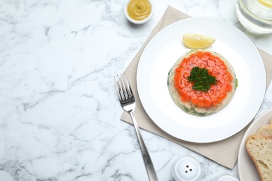 Photo of Delicious fish aspic served on white marble table, flat lay. Space for text