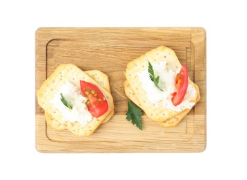 Photo of Delicious crackers with cream cheese, tomato and parsley on white background, top view