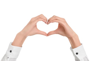 Photo of Woman showing heart gesture with hands on white background, closeup