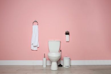 Photo of New ceramic toilet bowl in modern bathroom