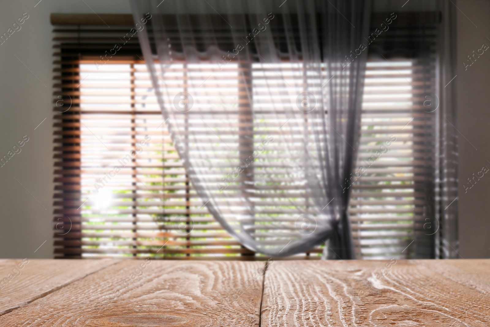 Image of Empty wooden table in room. Space for design