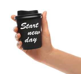 Image of Woman holding paper coffee cup with phrase START NEW DAY on white background, closeup