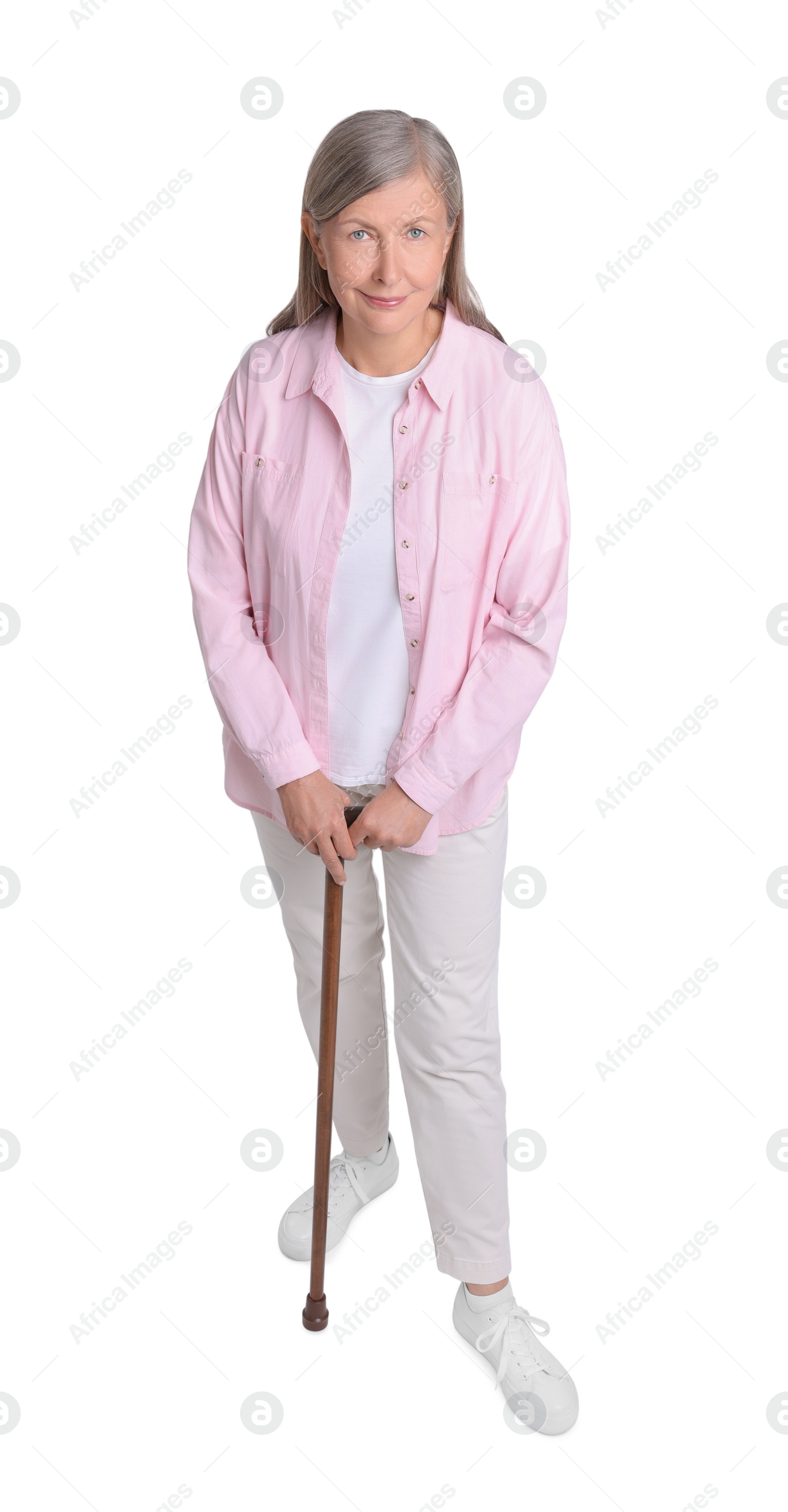 Photo of Senior woman with walking cane on white background, above view