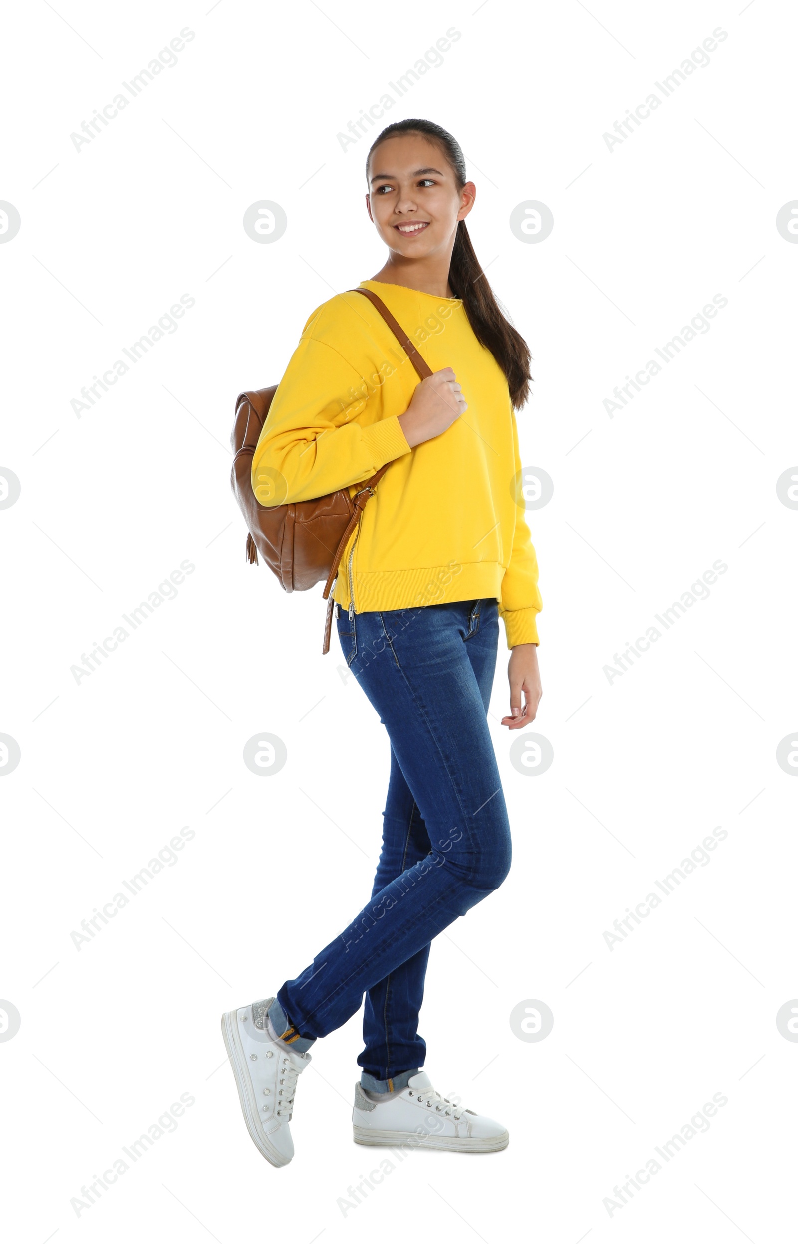 Photo of Teenager girl in casual clothes on white background