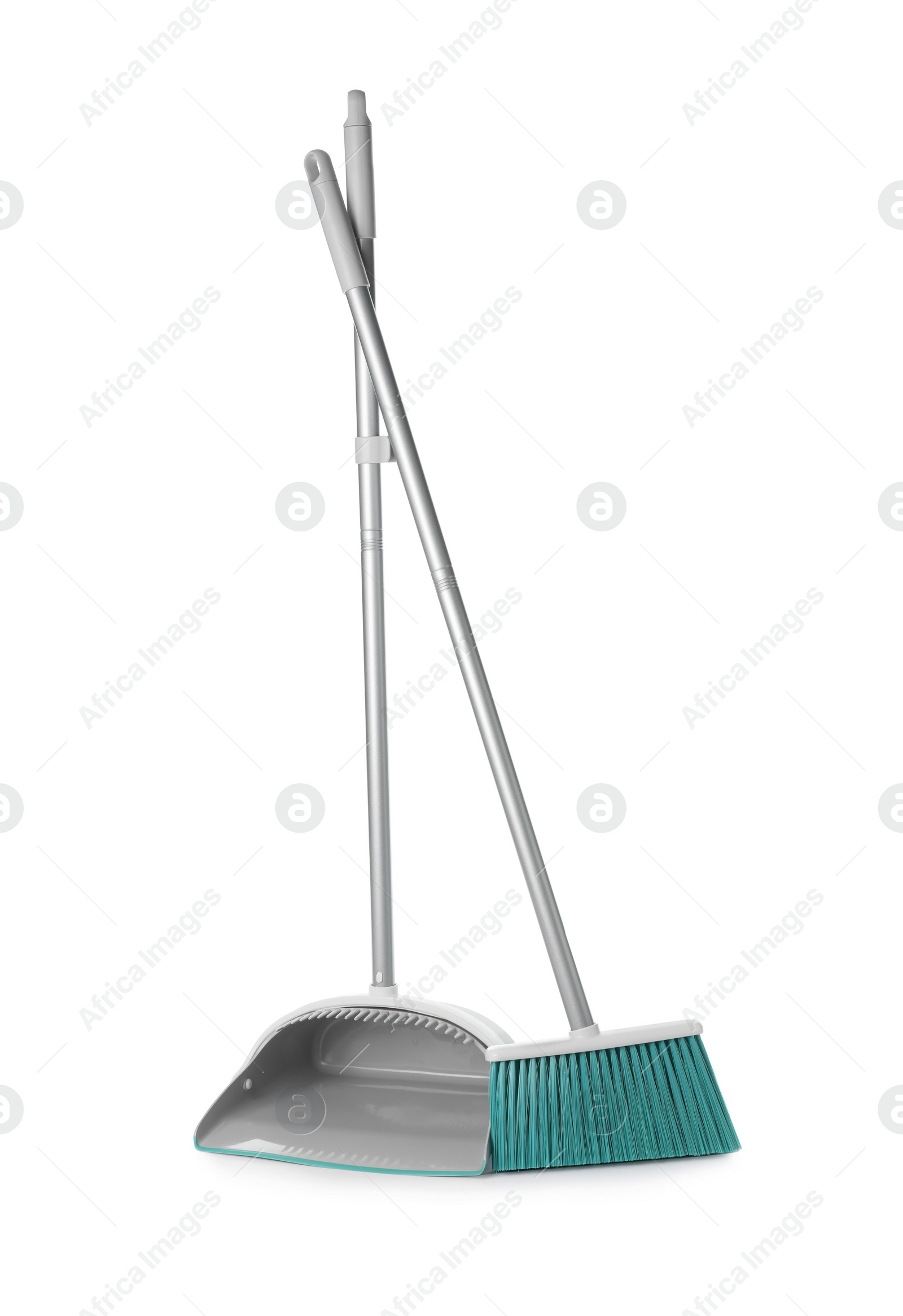 Photo of Plastic broom and dustpan on white background