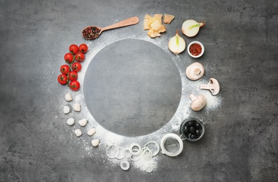 Photo of Composition with ingredients for pizza on gray background, top view