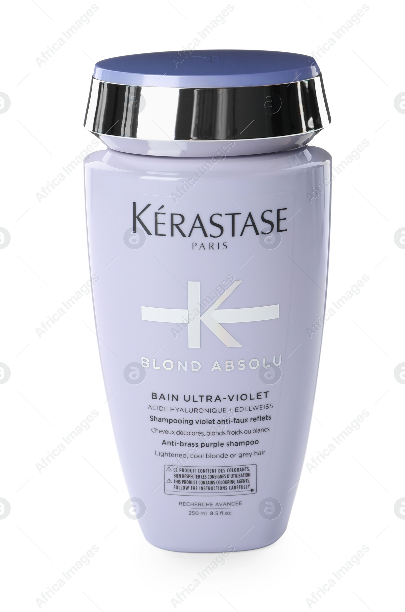 Photo of MYKOLAIV, UKRAINE - SEPTEMBER 08, 2021: Bottle of Kerastase hair care cosmetic product isolated on white