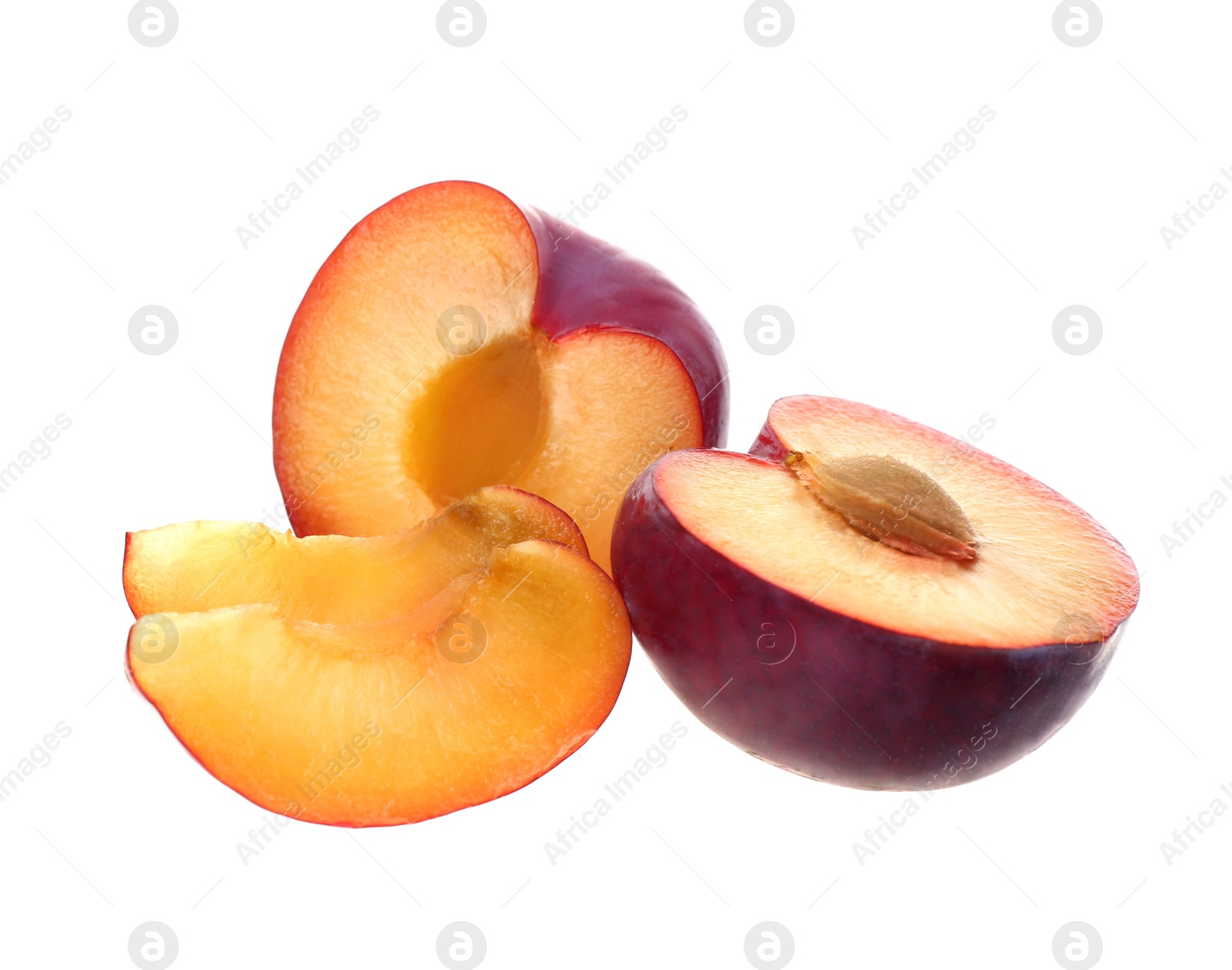 Photo of Cut fresh ripe plums isolated on white