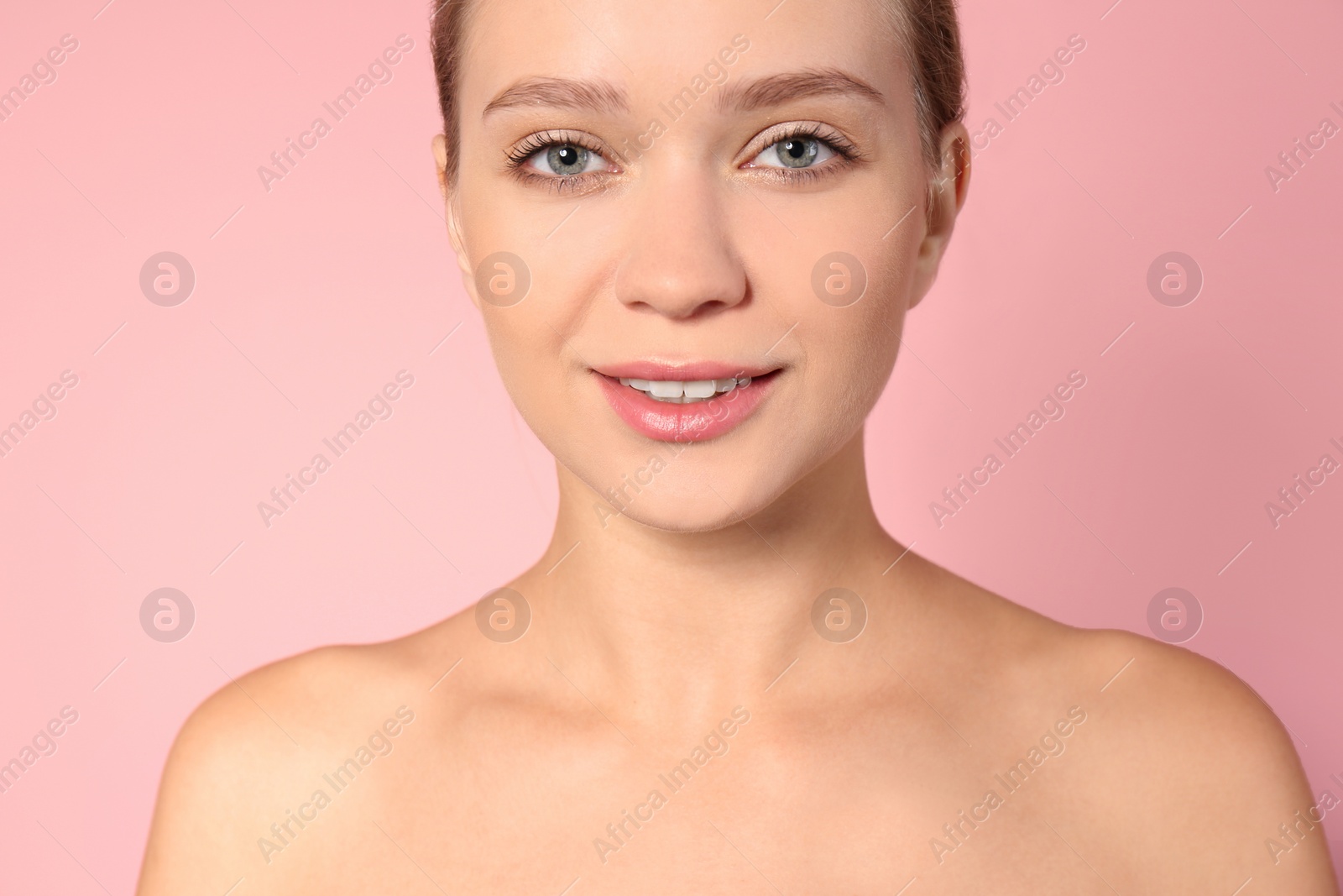 Photo of Portrait of beautiful young woman on color background. Lips contouring, skin care and cosmetic surgery concept