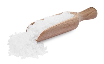 Photo of Wooden scoop and heap of natural sea salt isolated on white