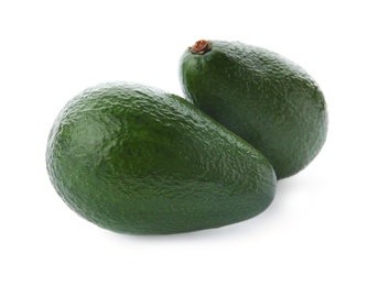 Ripe avocados on white background. Tropical fruit