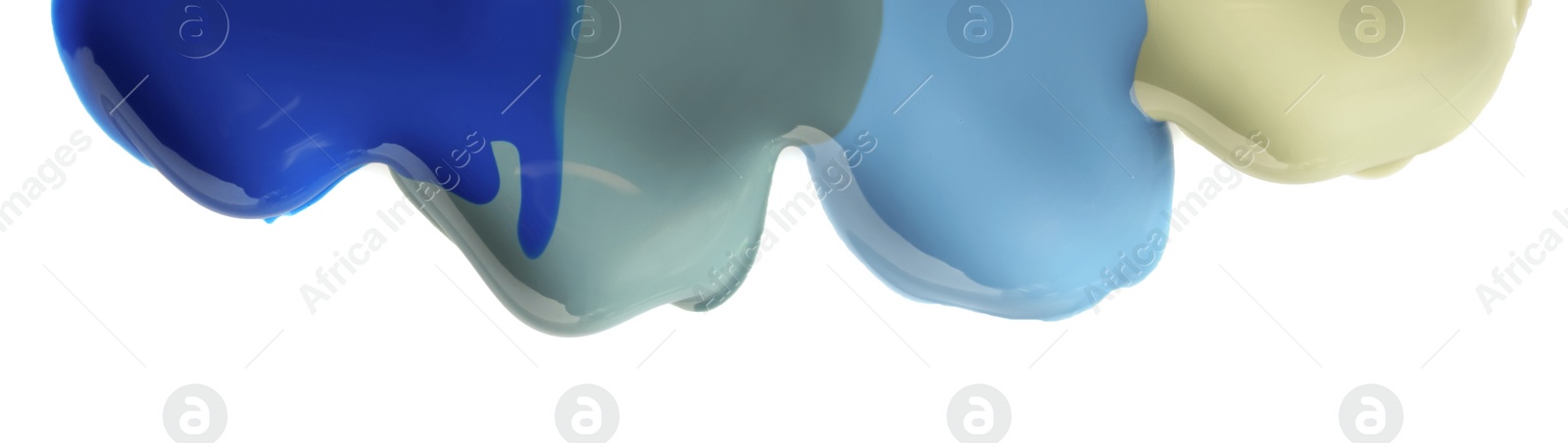 Photo of Mixed different color nail polishes flowing on white background