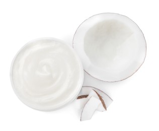 Jar of body cream with coconut on white background, top view