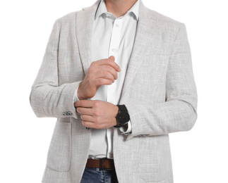 Photo of Businessman in jacket posing on white background, closeup