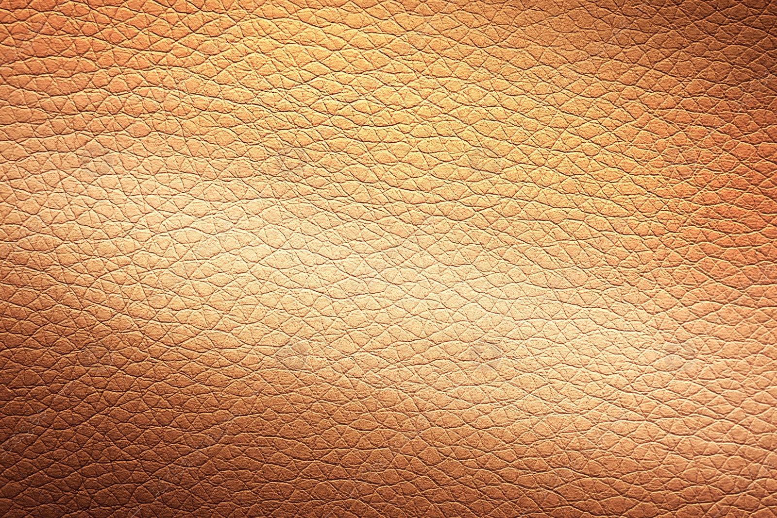 Image of Golden textured surface as background, closeup view