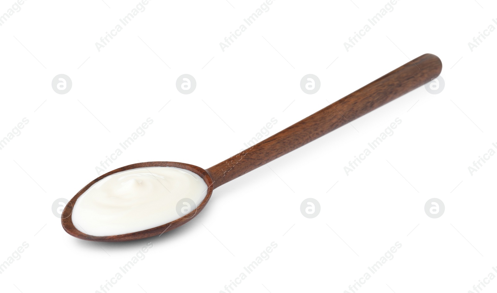 Photo of Wooden spoon with sour cream on white background