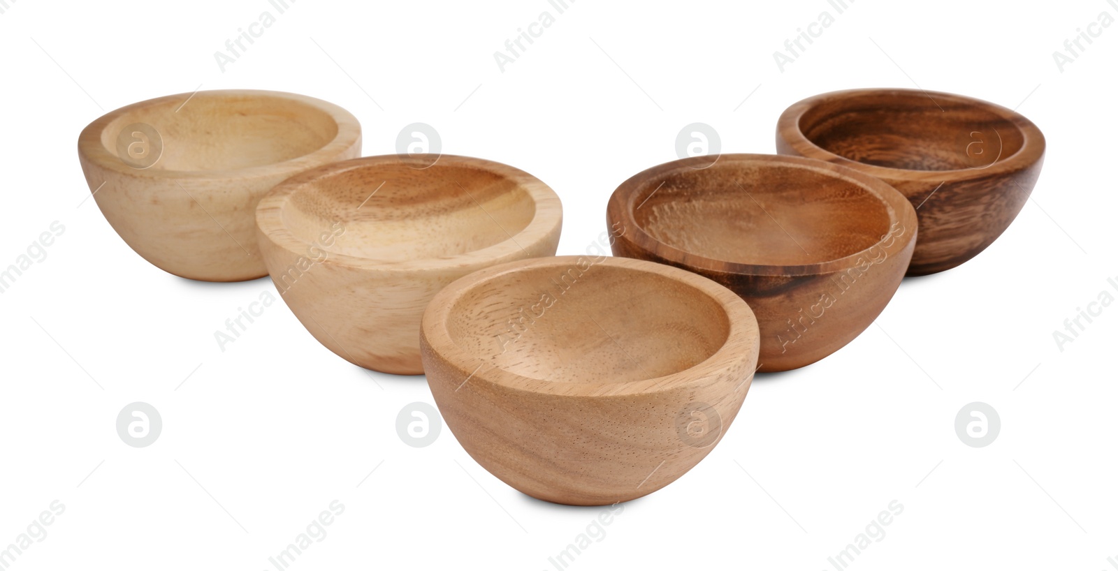 Photo of Set of wooden bowls on white background