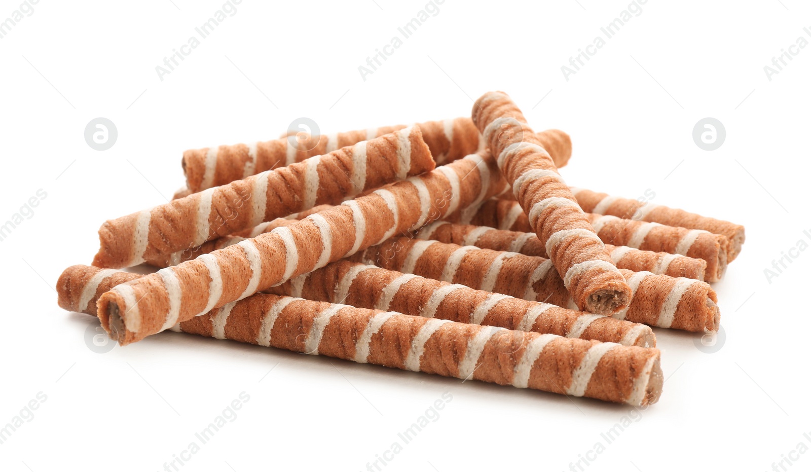 Photo of Tasty wafer roll sticks on white background. Crispy food