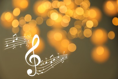 Image of Music notes on blurred background, bokeh effect