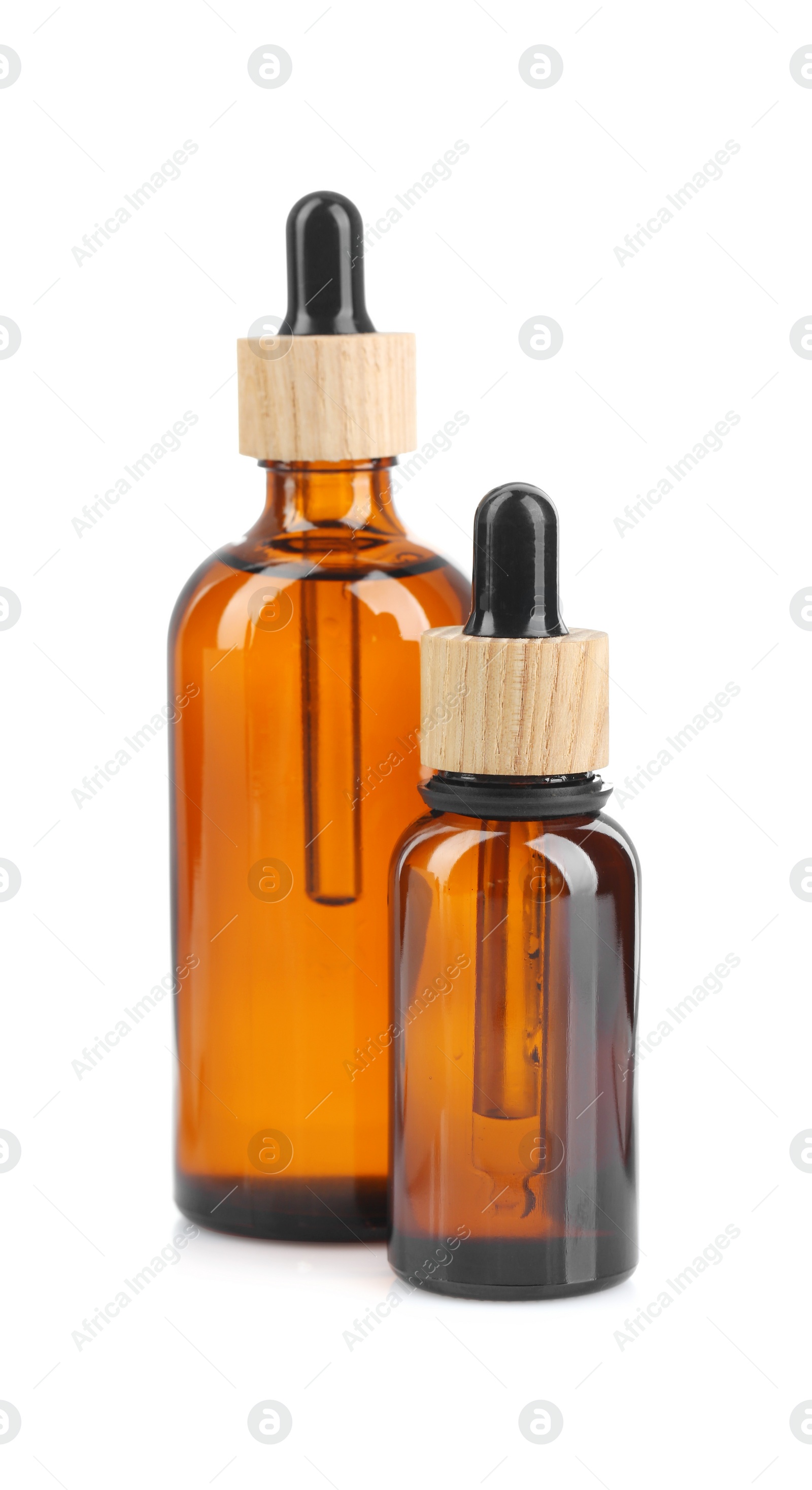 Photo of Glass bottles of tincture isolated on white