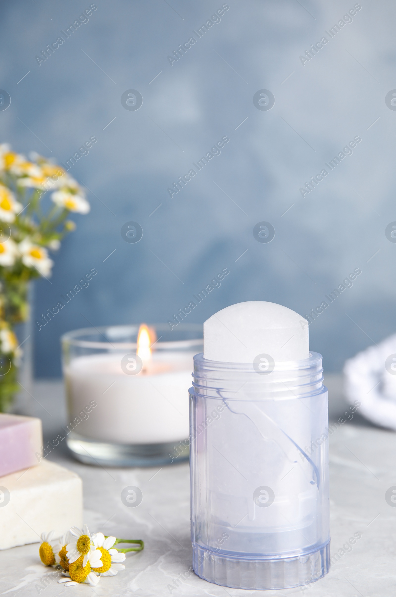 Photo of Natural crystal alum deodorant on light grey marble background