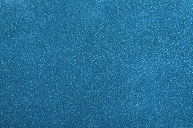 Shiny light blue glitter as background, closeup