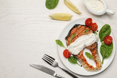 Photo of Tasty salmon steak served on white wooden table, flat lay. Space for text