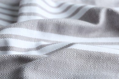 Texture of grey striped fabric as background, closeup