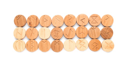 Photo of Many wooden runes isolated on white, top view