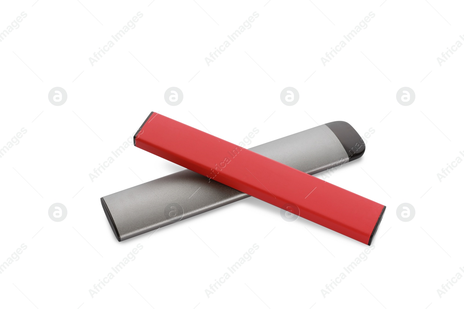 Photo of Two disposable electronic cigarettes on white background