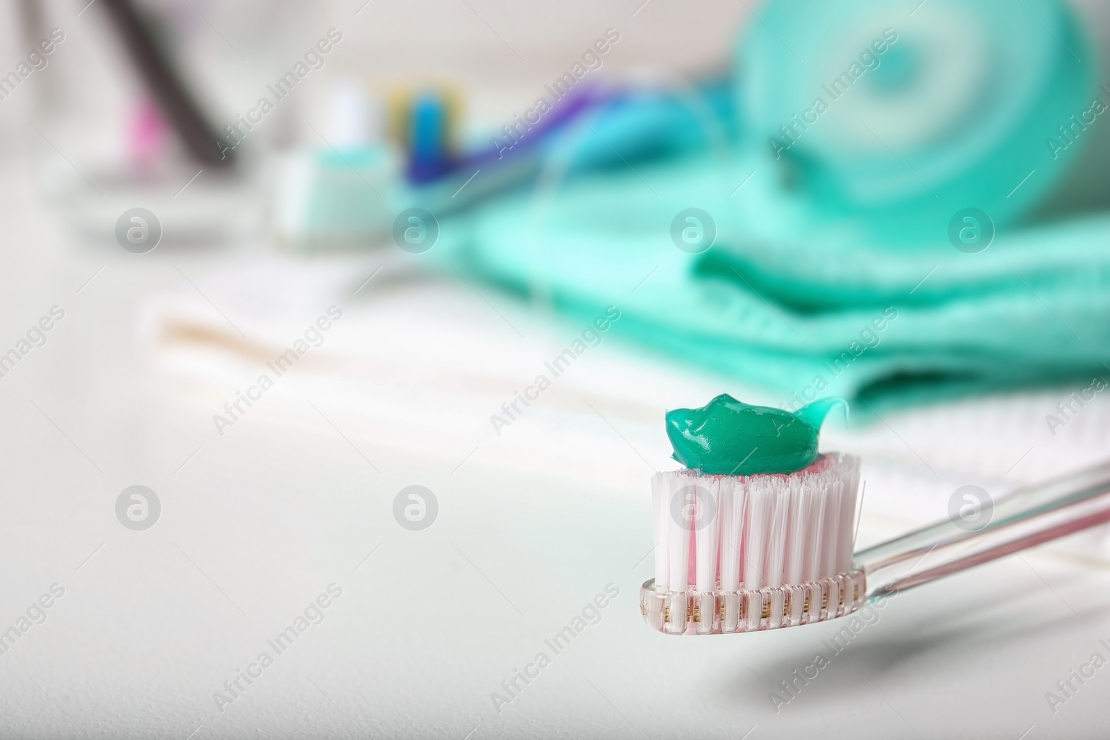 Photo of Manual toothbrush with paste on table. Dental care