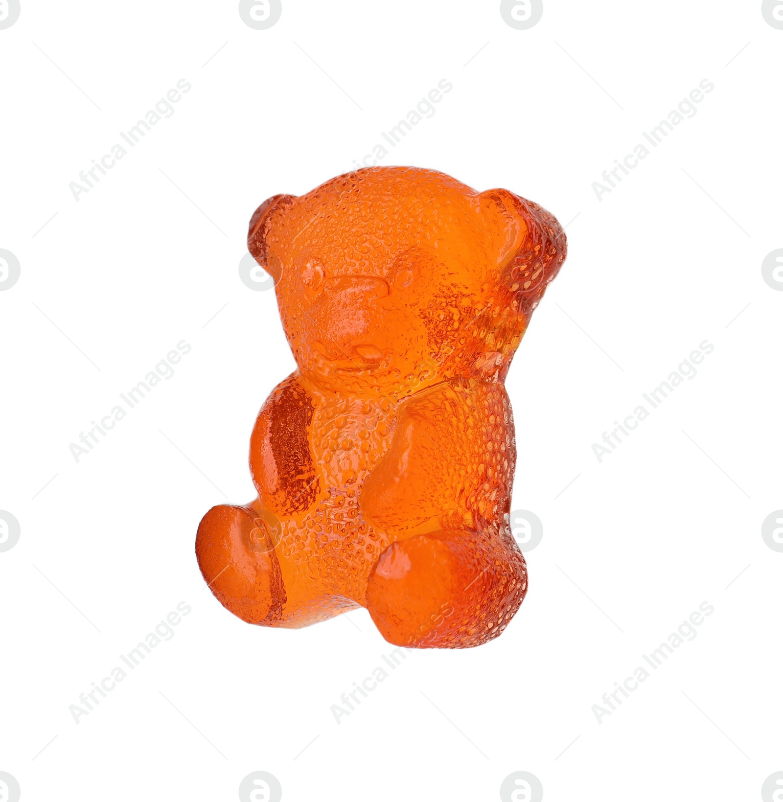 Photo of Delicious orange gummy bear candy isolated on white