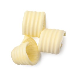 Three tasty butter curls isolated on white, top view