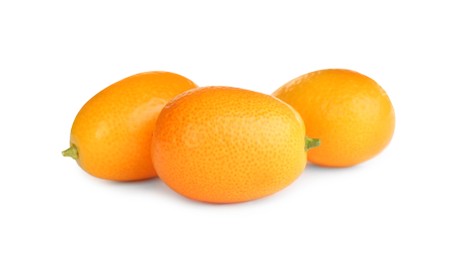 Photo of Fresh ripe kumquats on white background. Exotic fruit