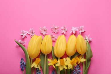 Photo of Beautiful different flowers on pink background, flat lay. Space for text