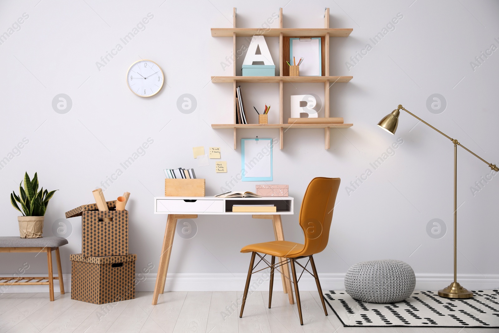 Photo of Stylish room interior with modern comfortable workplace