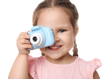 Photo of Little photographer taking picture with toy camera on white background