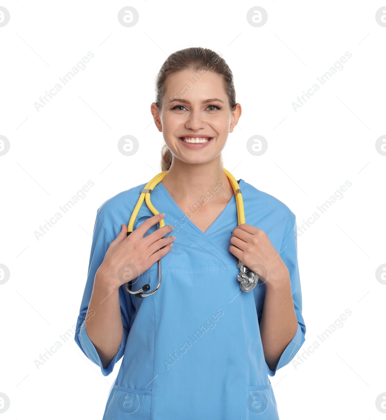 Photo of Portrait of young medical assistant with stethoscope on white background