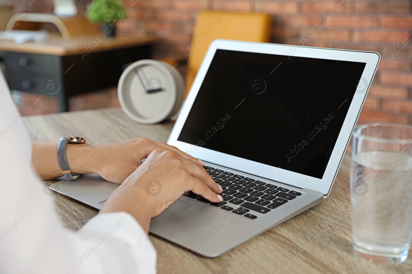 Photo of Woman using video chat on laptop in home office, closeup. Space for text