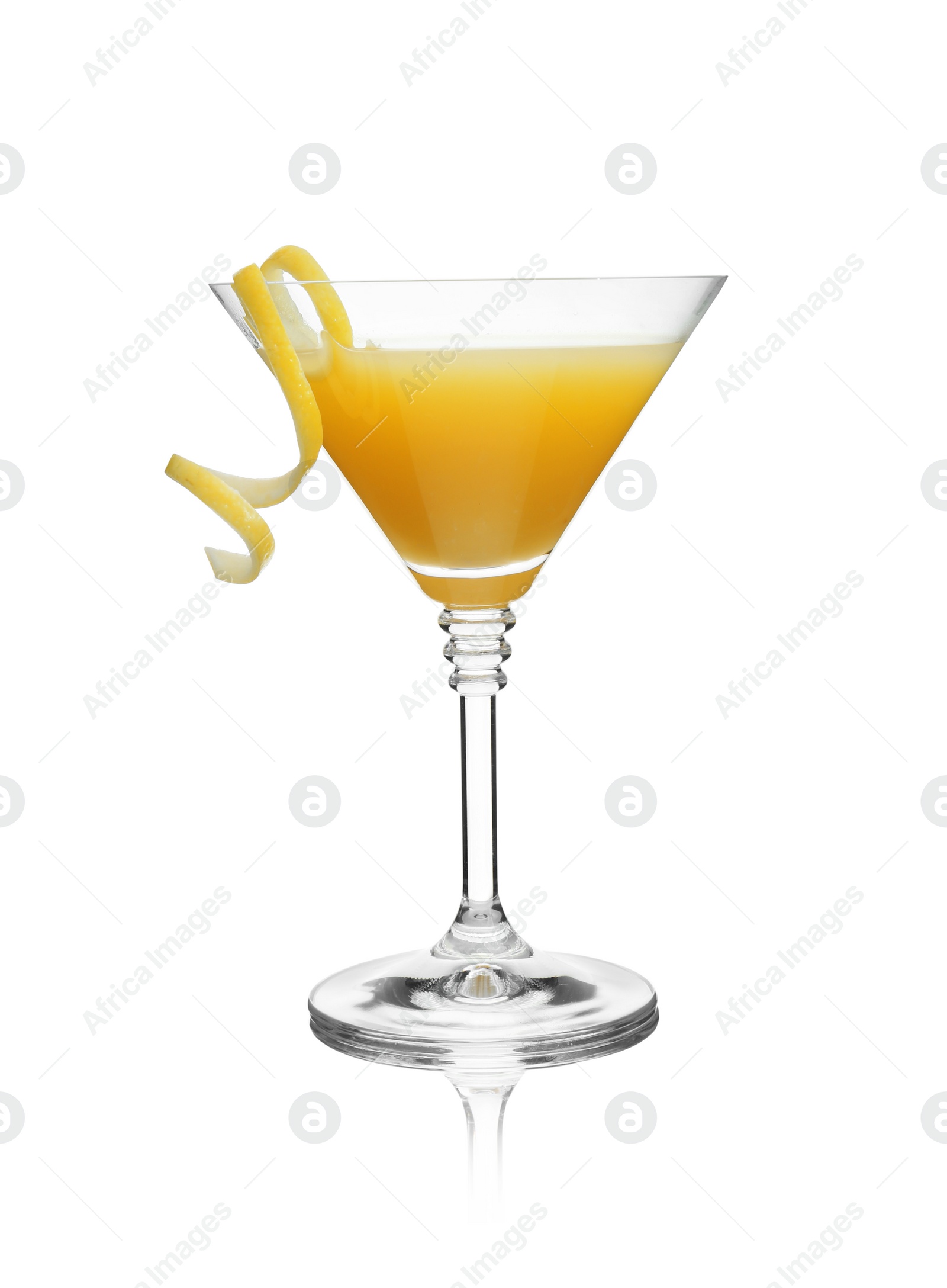 Photo of Glass of martini cocktail with lemon zest on white background