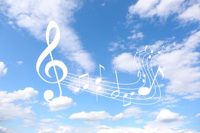 Image of Staff with treble clef and musical notes against sky